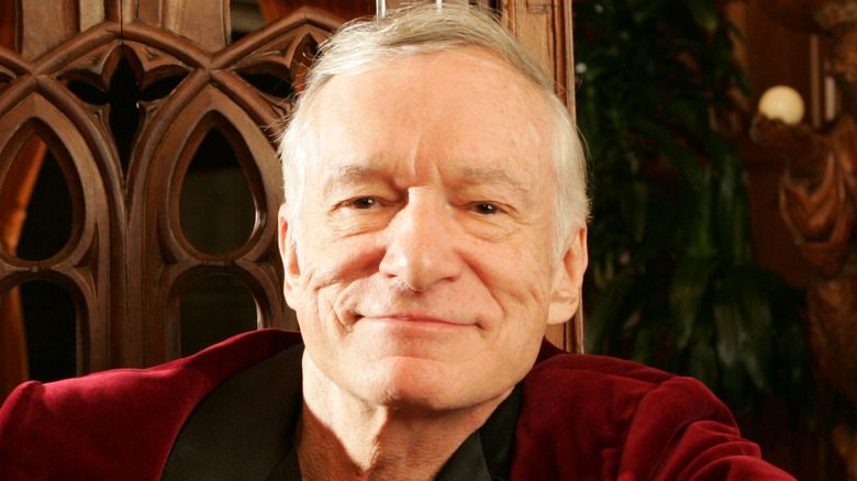 Hugh Hefner poses at the Playboy mansion