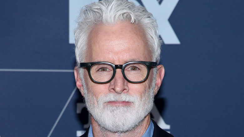 John Slattery wearing glasses