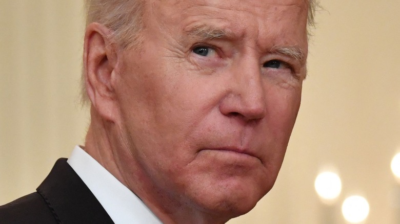 Joe Biden purses his lips at an engagement