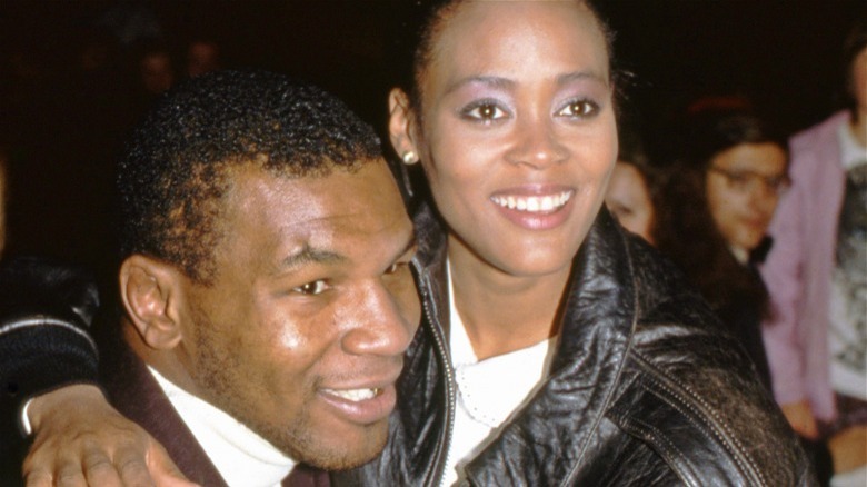 Mike Tyson hugs Robin Givens