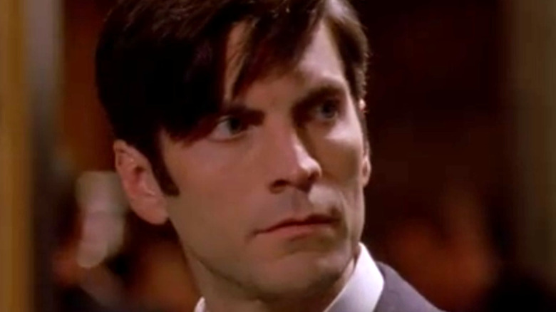 Wes Bentley staring to the left on AHS