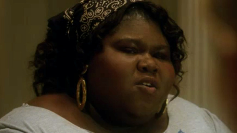 Gabourey Sidibe wearing headscarf as Queenie