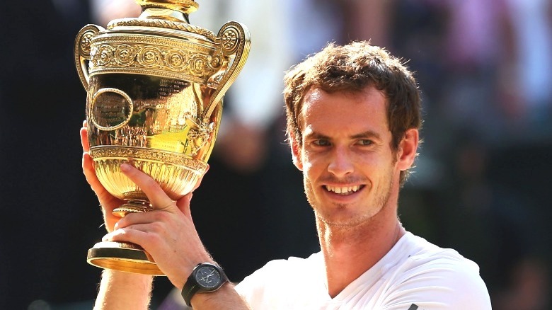 Andy Murray smiling with trophy