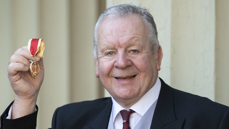 Bill Beaumont with knighthood medal