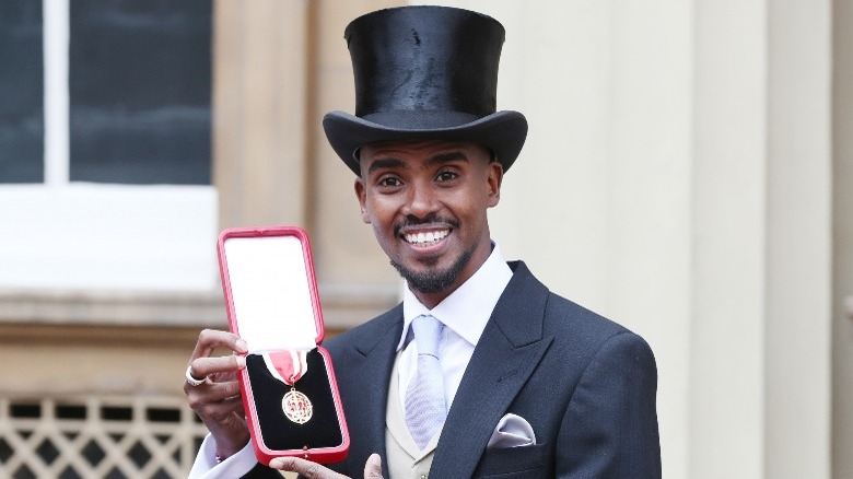 Mo Farah with knighthood medal