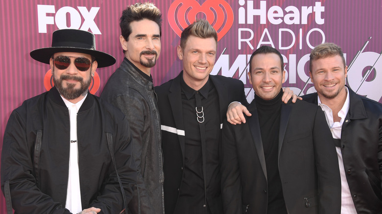 Backstreet Boys in black suits 