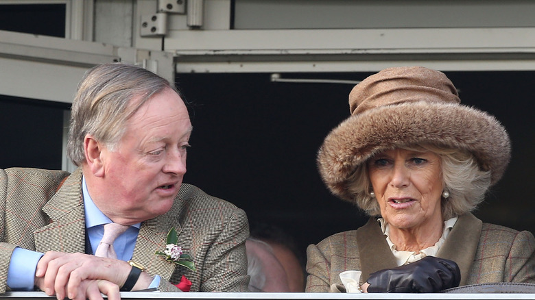 Andrew Parker Bowles talking to Camilla Parker Bowles.