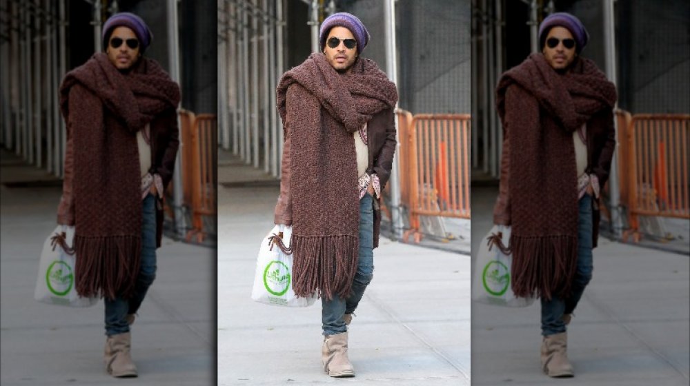 Lenny Kravitz paparazzi photo, running errands and wearing a big scarf