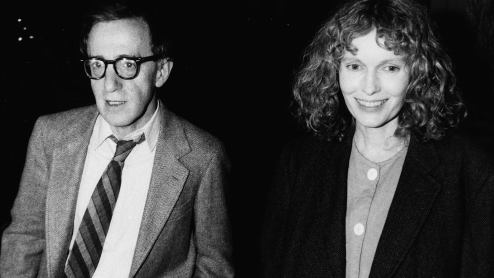 Woody Allen and Mia Farrow walking together