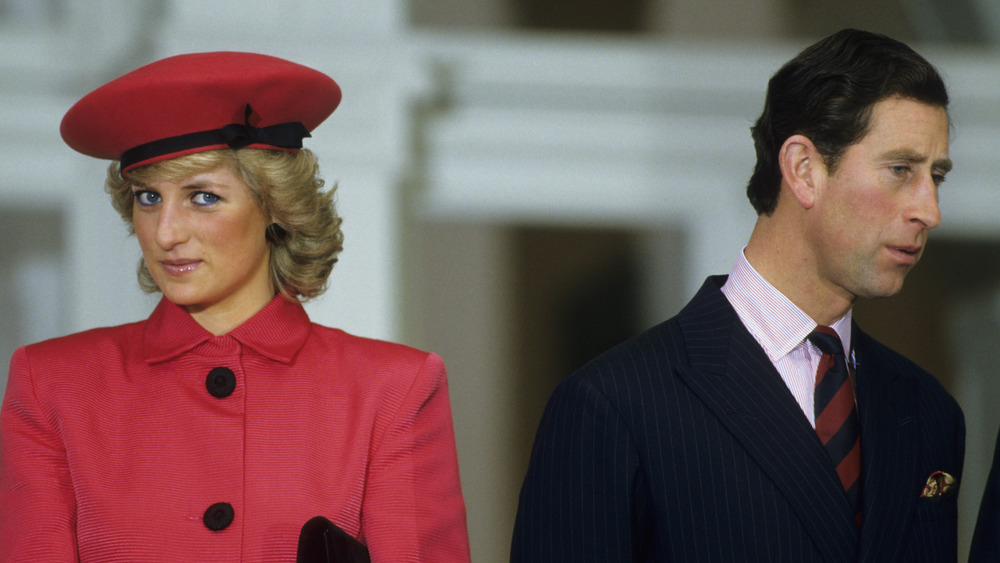 Princess Diana and Prince Charles looking in opposite directions