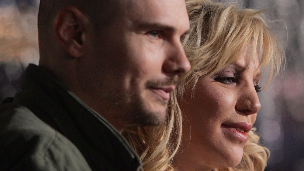 Courtney Love and Billy Corgan profile view