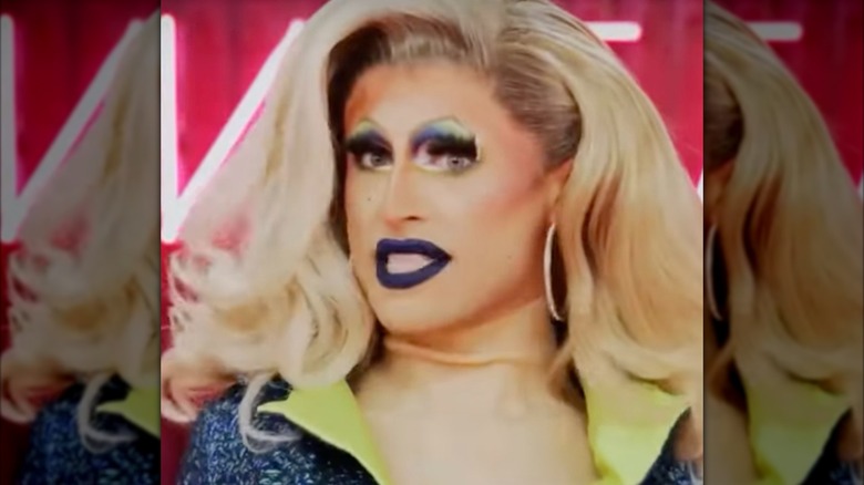 Amanda Tori Meating smiling in her entrance on "Drag Race"