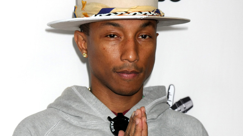 Pharrell Williams posing