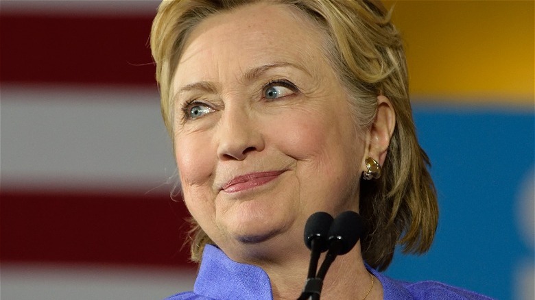 Hillary Clinton, looking left