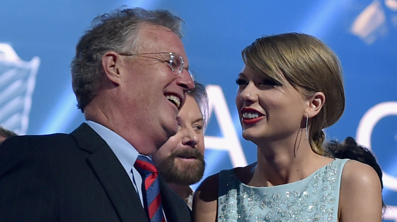 Scott and Taylor Swift laughing