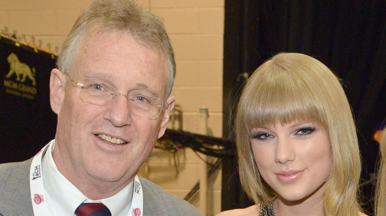 Scott and Taylor Swift smiling