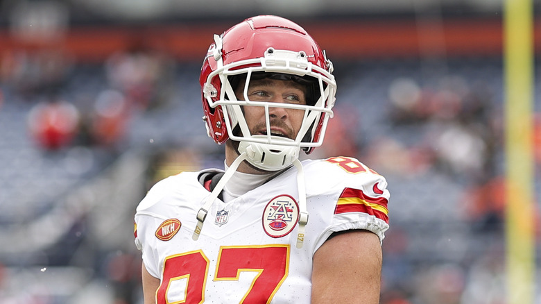 Travis Kelce playing football