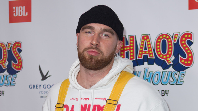 Travis Kelce in black cap