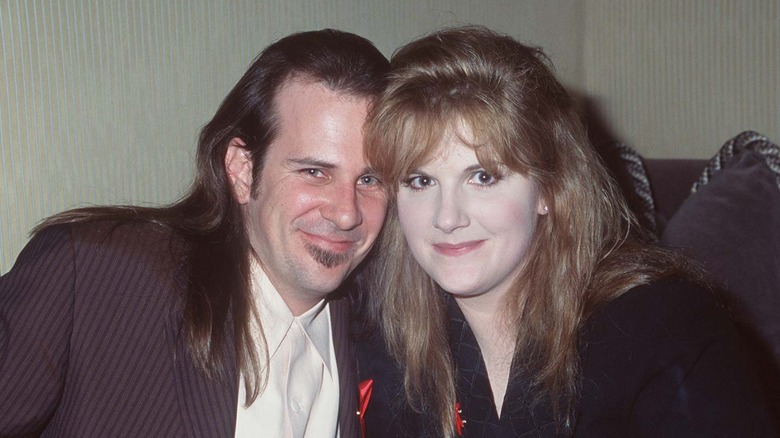 Trisha Yearwood and Robert Reynolds pose together at the MCA Grammy's party