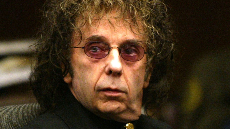 Phil Spector in court, looking away