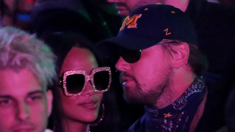  Leonardo DiCaprio talking to Rihanna 