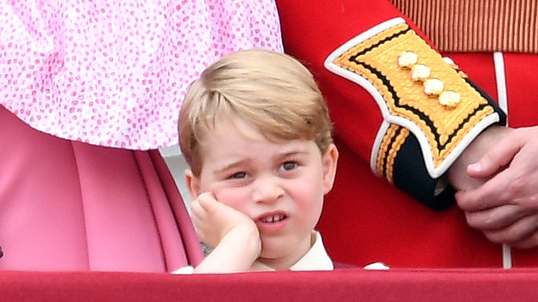 Prince George resting hand on chin