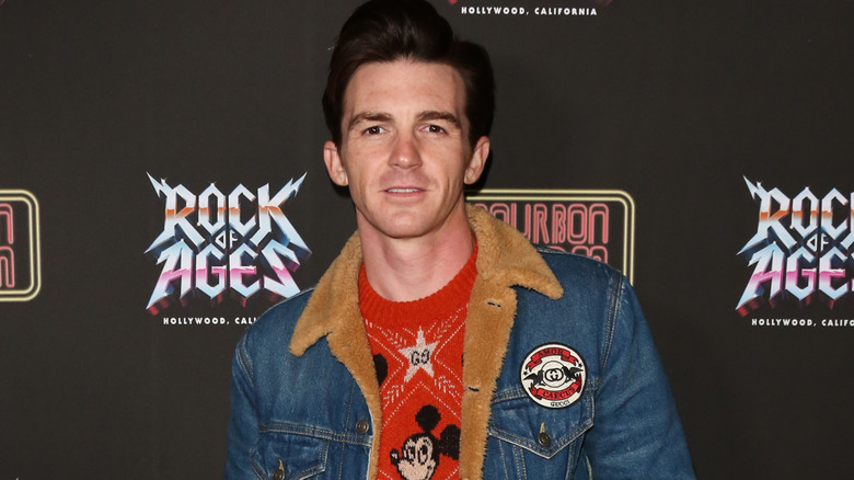 Drake Bell in jean jacket 