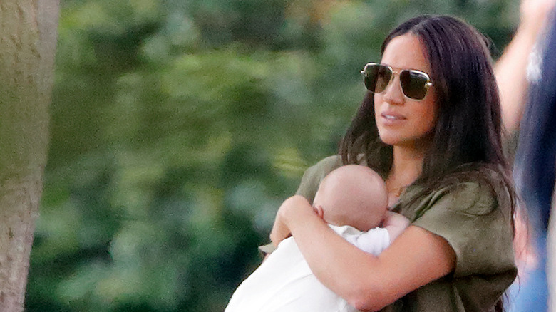 Meghan Markle holds Archie