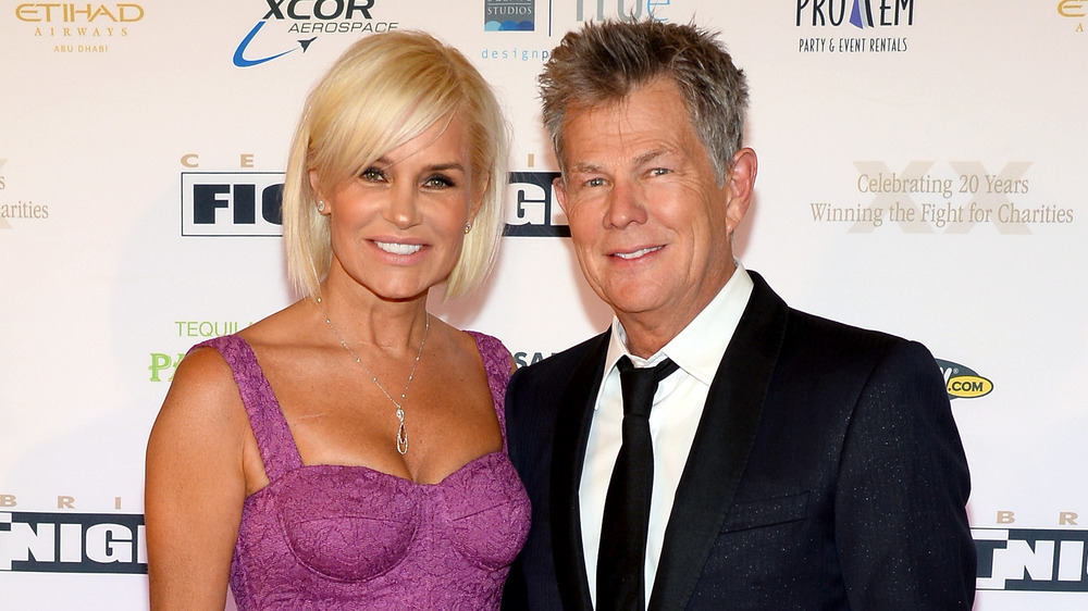 Yolanda Hadid and David Foster smiling on the red carpet