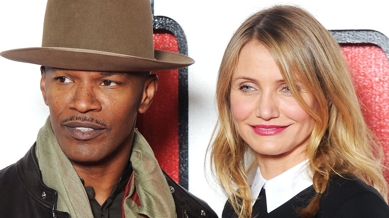 Jamie Foxx wearing a big hat and Cameron Diaz posing with a black shirt and pink lipstick