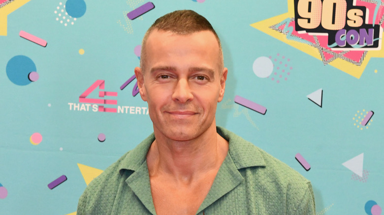 Joey Lawrence smiling on red carpet