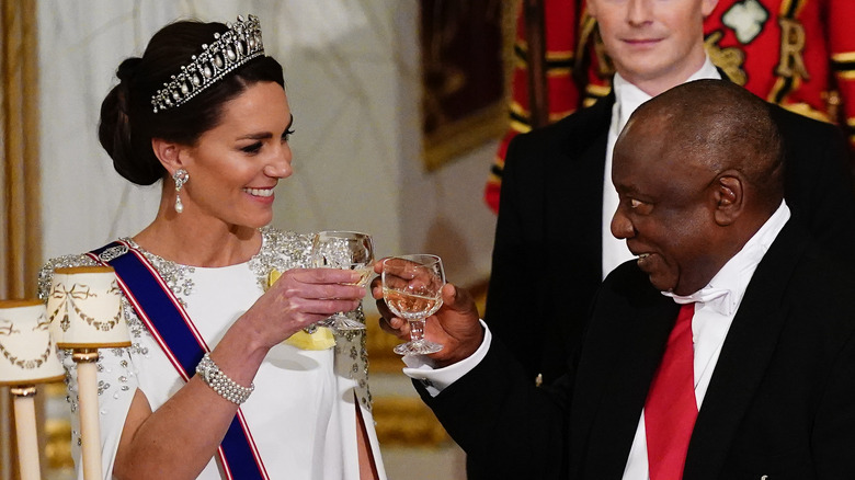 Kate Middleton toasting her glass