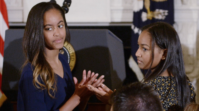 Sasha and Malia Obama at Joe Biden's 2017 Medal of Freedom ceremony