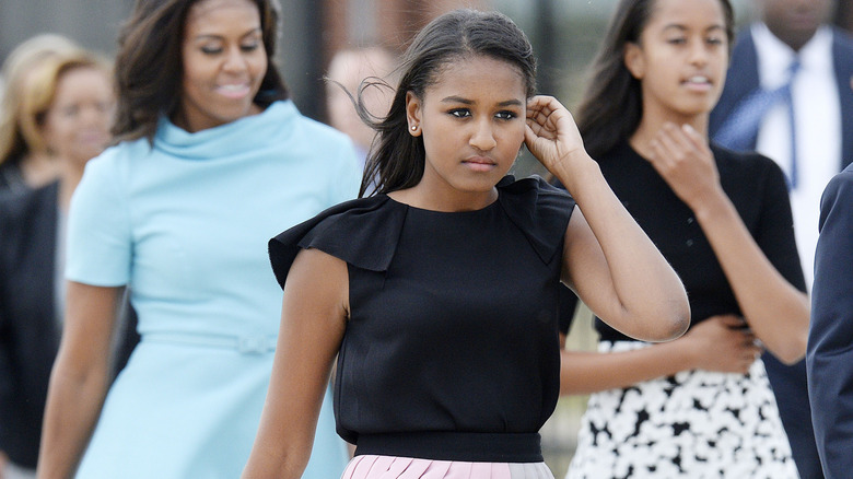 Sasha Obama, Michelle Obama, and Malia Obama arriving to welcome Pope Francis