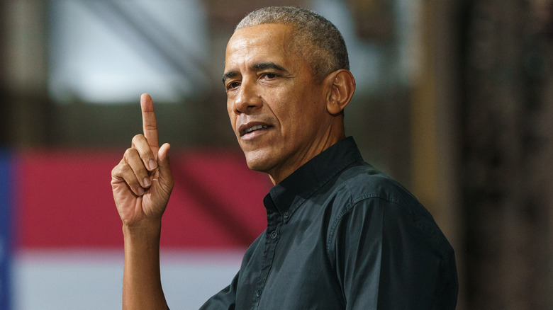 Barack Obama points a finger upwards