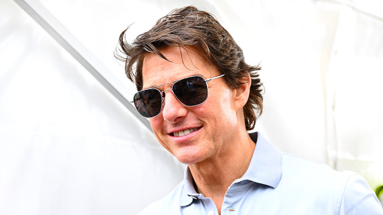 Tom Cruise grinning