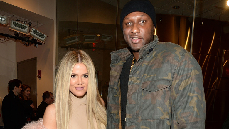 Khloe Kardashians and Lamar Odom both smiling