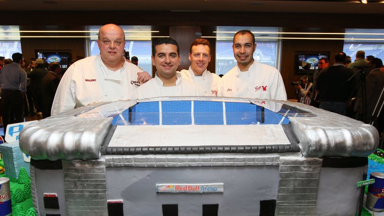 The Cake Boss cast with Remy Gonzalez (right)