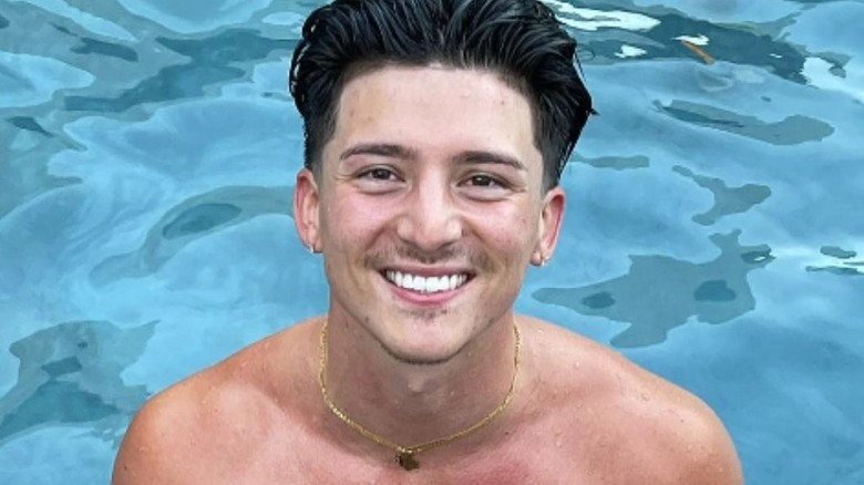 Tony Lopez smiling in pool