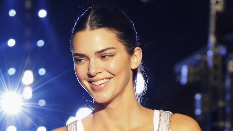 Kendall Jenner looking away, smiling