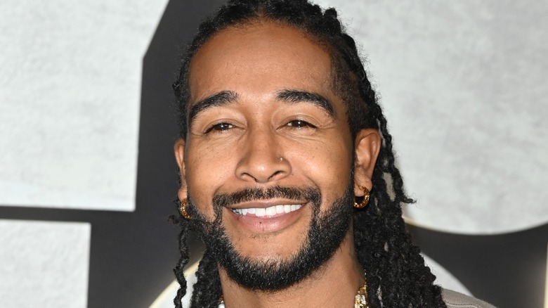 Omarion smiling at event