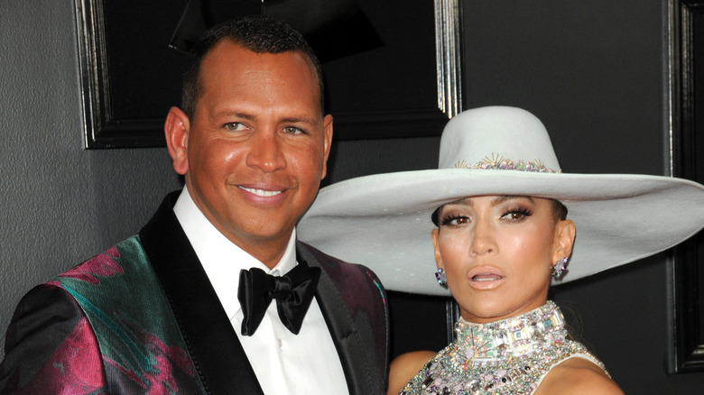 Alex Rodriguez and Jennifer Lopez posing