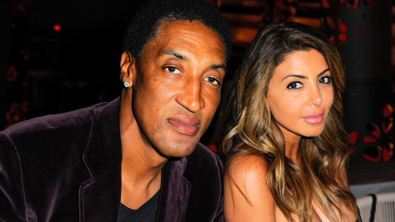 Scottie Pippen and Larsa Pippen looking at camera