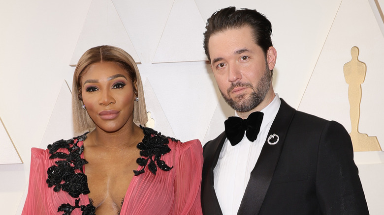 Serena Williams and Alexis Ohanian looking at camera