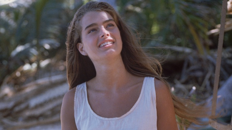 Teenage Brooke Shield smiling on set of "The Blue Lagoon"