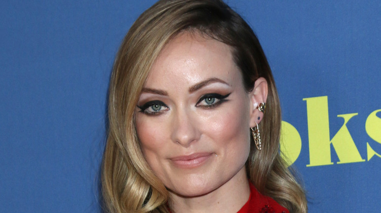 Olivia Wilde smirking