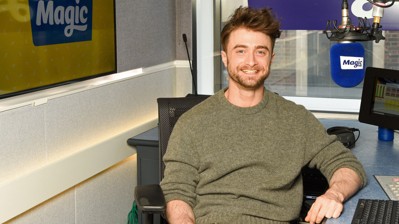 Daniel Radcliffe smiling at a press event