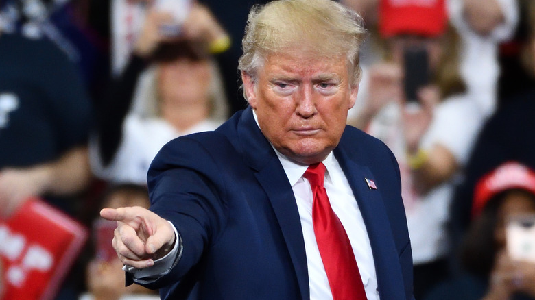 Donald Trump points at a rally