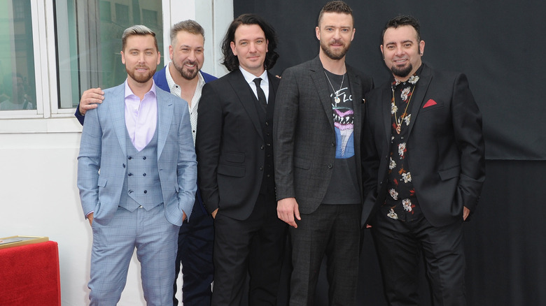 *NSYNC posing together in 2018