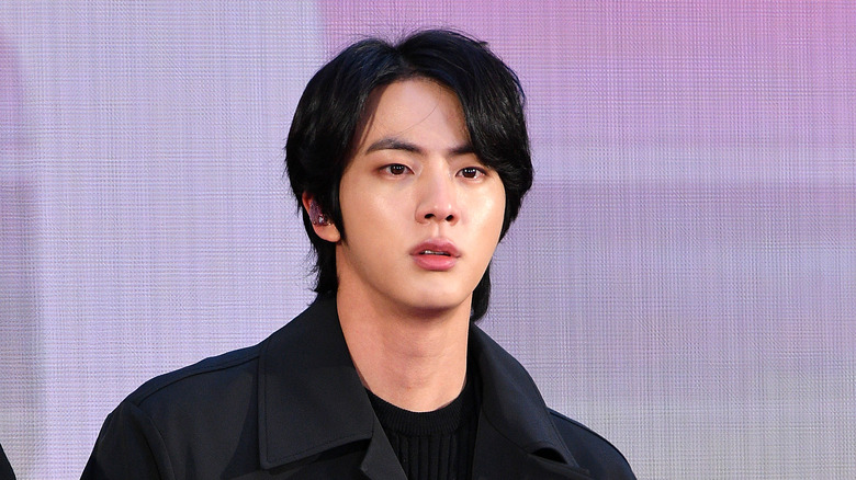 Jin of BTS looking serious